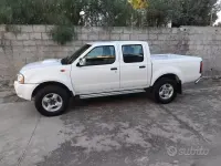 Usata Nissan Navara 133 CV (97 kW) 2011 Bianco Pick-up