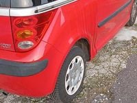 Usata Peugeot 1007 70 CV (51 kW) 2006 Rosso Monovolume