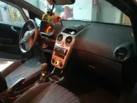 Usado Opel Corsa 75 HP (55 kW) 2007 Cinzento Citadino