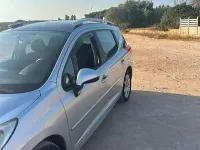 Usata Peugeot 207 Outdoor Outdoor 90 CV (66 kW) 2008 Argento Station wagon