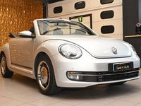Käytetty VW Beetle Cabriolet Sport 150 HP (110 kW) 2015 Hopea Avoauto