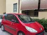 Usata Peugeot 1007 73 CV (53 kW) 2005 Rosso Monovolume