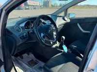 Usado Ford Fiesta 82 HP (60 kW) 2009 Cinzento Sedan