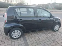 Usata Daihatsu Sirion 69 CV (50 kW) 2006 Nero Utilitaria