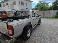 Usata Nissan Navara 133 CV (97 kW) 2004 Grigio Pick-up