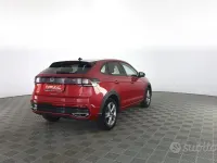 Usata VW Taigo R-line 110 CV (80 kW) 2024 Kings red con tetto nero pastello SUV