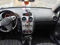 Occasion Opel Corsa Enjoy 80 ch (58 kW) 2009 Argent Berline