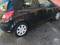 Usata Opel Corsa Cosmo 90 CV (66 kW) 2011 Nero Utilitaria