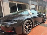 Begagnad Porsche 911 541 HK (397 kW) 2025 Svart Cab