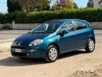 Usado Fiat Punto Lounge 75 CV (55 kW) 2013 Verde Utilitario