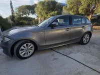 Usata BMW 118 Lifestyle 143 CV (105 kW) 2010 Grigio Utilitaria