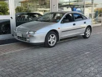Usata Mazda 323F 144 CV (105 kW) 1997 Grigio Berlina