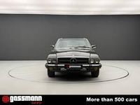Begagnad Mercedes SL380 204 HK (150 kW) 1985 Grå Cab