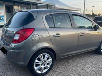 Usata Opel Corsa Cosmo 75 CV (55 kW) 2011 Marrone Utilitaria