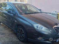 Usata Lancia Delta 120 CV (88 kW) 2012 Grigio Utilitaria