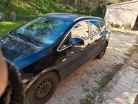 Usata Opel Astra Cosmo 101 CV (74 kW) 2011 Nero Station wagon
