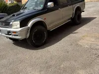 Usata Mitsubishi L200 100 CV (73 kW) 1998 Nero Pick-up