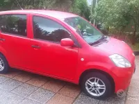 Usata Daihatsu Sirion 69 CV (50 kW) 2006 Rosso Utilitaria