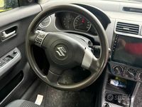 Usata Suzuki Swift 92 CV (67 kW) 2006 Grigio Utilitaria