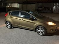 Usata Ford Fiesta 82 CV (60 kW) 2011 Marrone Berlina