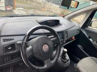 Käytetty Fiat Idea 70 HP (51 kW) 2010 Musta Tila-auto