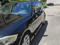 Usata BMW 318 143 CV (105 kW) 2007 Nero Station wagon