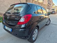 Usata Opel Corsa 74 CV (54 kW) 2011 Nero Utilitaria