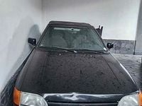 Begagnad Ford Escort Cabriolet 102 HK (75 kW) 1991 Svart Cab