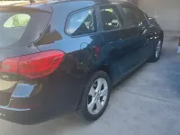 Usata Opel Astra 110 CV (80 kW) 2013 Nero Station wagon