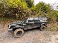Usata Nissan Navara 103 CV (75 kW) 1999 Nero Pick-up