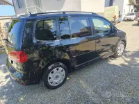 Käytetty VW Touran Comfortline 105 HP (77 kW) 2012 Musta Tila-auto