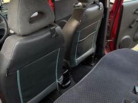 Second-hand Nissan Micra 60 CP (44 kW) 2004 Roșu Hatchback