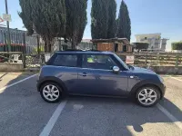 Używany Mini Cooper 109 KM (80 kW) 2009 Niebieski Hatchback