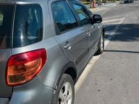 Usata Suzuki SX4 90 CV (66 kW) 2009 Marrone Berlina