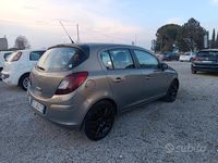 Usata Opel Corsa 85 CV (62 kW) 2012 Marrone Utilitaria