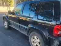 Second-hand Jeep Cherokee 163 CP (119 kW) 2005 Negru SUV