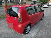 Usata Daihatsu Sirion 69 CV (50 kW) 2011 Rosso Utilitaria