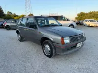 Usata Opel Corsa 45 CV (33 kW) 1989 Grigio Berlina