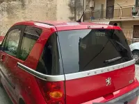 Usata Peugeot 1007 73 CV (53 kW) 2005 Rosso Monovolume