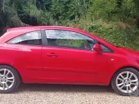 Usata Opel Corsa 80 CV (58 kW) 2007 Rosso Utilitaria