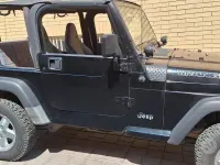 Usata Jeep Wrangler 118 CV (86 kW) 1997 Nero SUV