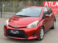 Usata Toyota Yaris Hybrid Lounge 75 CV (55 kW) 2013 Arancione Berlina