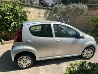 Usata Peugeot 107 68 CV (50 kW) 2013 Grigio Utilitaria