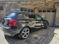 Usata BMW 118 Efficient Dynamics 143 CV (105 kW) 2014 Nero Utilitaria