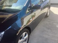 Usata Opel Astra 110 CV (80 kW) 2013 Nero Station wagon