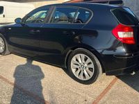Usata BMW 120 163 CV (119 kW) 2006 Nero Utilitaria