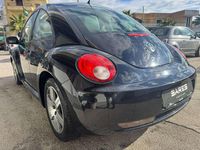 Usata VW New Beetle 102 CV (75 kW) 2009 Nero Utilitaria