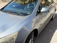 Usata Opel Astra 131 CV (96 kW) 2012 Grigio Berlina