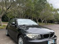 Usata BMW 116 115 CV (84 kW) 2010 Nero Utilitaria