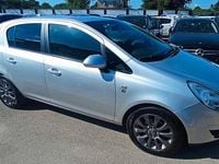 Usata Opel Corsa 75 CV (55 kW) 2011 Argento Berlina